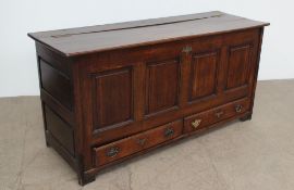 An 18th century oak mule chest,