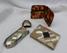 A mother of pearl and white metal inlaid card case,