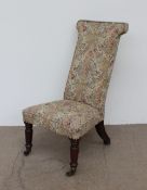 A Victorian prie dieu, with an upholstered top,