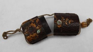 A Japanese bark effect five division Inro, with gilt lacquer decoration and mother of pearl inlay,