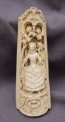A 19th century continental ivory tobacco rasp depicting figures emerging from a woodland,