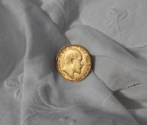 An Edward VII gold sovereign dated 1908