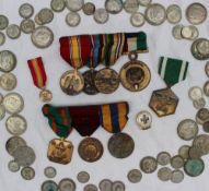 A collection of medals including a United States expeditionary medal,