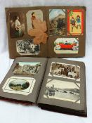 Two postcard albums containing circa 300 cards including Irish Life, views of Tranmore, Aberystwyth,