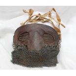A World War I tank crew splatter mask, with a chain mail mouth guard,