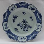 A Chinese blue and white porcelain bowl, with a raised leaf border,