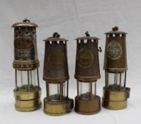 A Thomas & Williams steel and brass miners lamp,