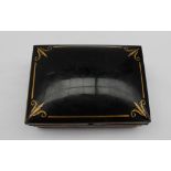 A 19th century Japanned tin spice box of rectangular form with gilt highlights on ball feet,