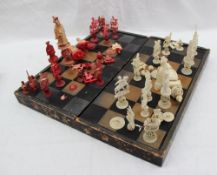 A 19th century Chinese puzzle ball part chess set,