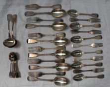 A Victorian silver fiddle pattern part flatware service, comprising six table spoons,