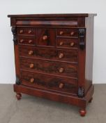 A Victorian mahogany chest, the rectangular top above a frieze drawer,
