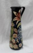 A Moorcroft limited edition jug, of tapering cylindrical form with triangular handle,