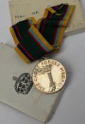 An Elizabeth II Cadet Forces Medal issued to Major H.E.