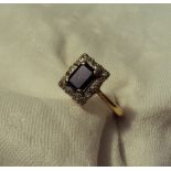 A Sapphire and diamond ring,