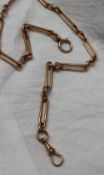 A 9ct gold Albert chain with flattened oval links,