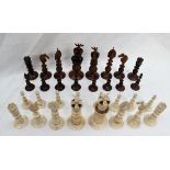 A 19th century Anglo Indian ivory chess set, natural and stained brown,