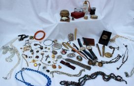 Assorted costume jewellery including a cameo bracelet, wristwatches, lighters,