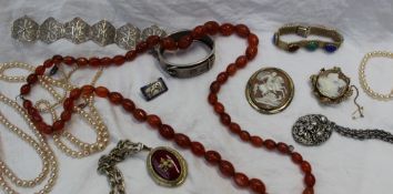 A hardstone bead necklace together with a shell cameo of George and the Dragon,