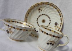 An 18th century Worcester porcelain trio comprising a tea cup, coffee cup and saucer,