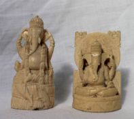Of Hindu interest - A late 19th / early 20th century figure of Ganesha, seated cross legged,