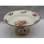 A Nantgarw open tureen painted with a central spray of flower heads and strawberries,