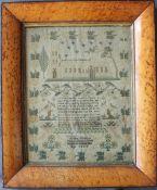 An early 19th century sampler, depicting "Bengall Cathedral", trees,