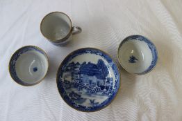 A Newhall porcelain tea cup and saucer with two matching tea bowls,