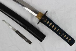 A Wakizashi, signed Izumi no Kami Kunisada, Shinto The blade with one mekugi-ana,