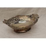 A George VI silver pedestal dish of oval form with a pierced rim, engraved to the centre, Sheffield,