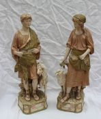 A pair of large Royal Dux Bohemia figures modelled as a shepherd and shepherdess,