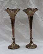 A pair of Edward VII silver trumpet vases, with a beaded quatrefoil rim on a spreading foot, No.
