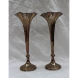 A pair of Edward VII silver trumpet vases, with a beaded quatrefoil rim on a spreading foot, No.