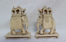 Two 19th century ivory figures of elephants, with howdah and figures,