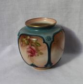 A Hadley's Worcester vase decorated with roses and leaves with insects to panels, 8cm high,