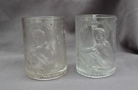Two glass tankards commemorating Canada's Edward "Ned" Hanlan's victory over Edward Trickett of N.S.