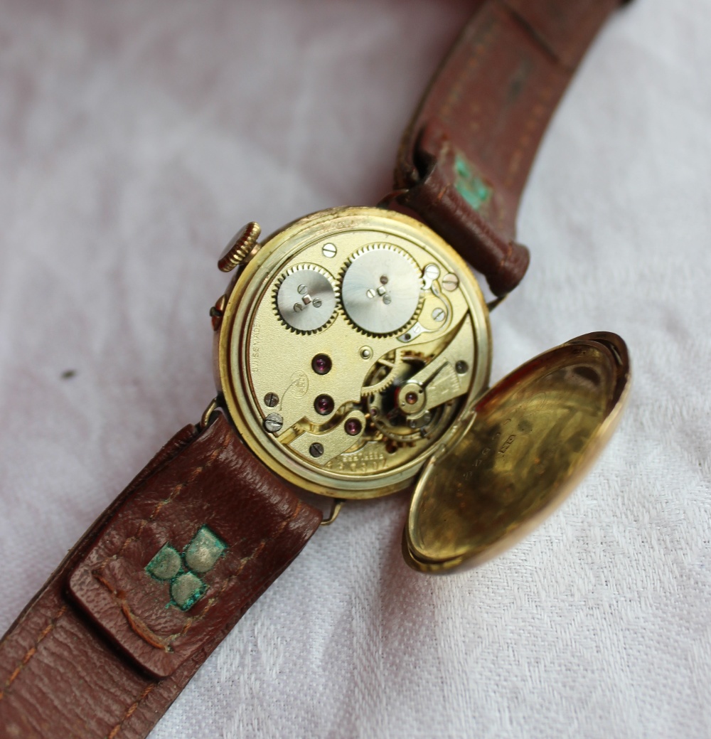 A 9ct yellow gold Gentleman's wristwatch with an enamel dial and seconds subsidiary dial on a - Image 2 of 3