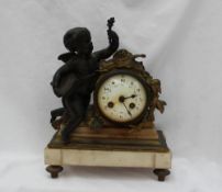 A 19th century French bronze and marble mantle clock,