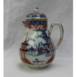 A Chinese porcelain sparrow beak lidded jug, underglaze blue decoration of buildings and trees,