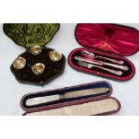 A late Victorian cased set of four cauldron shaped table salts, Sheffield, 1898, Walker & Hall,