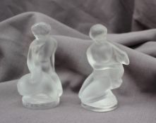 Lalique - A figure kneeling holding a swan, engraved signature, 11.