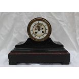 A late Victorian black slate and variegated marble mantle clock,