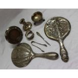 A Victorian silver cauldron shaped table salt, with a beaded rim on four ball and claw feet, London,