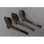 Three clay pipes, each moulded "Nantgarw and Pardoe" to either side of the stem,