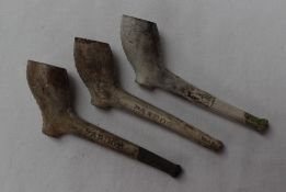 Three clay pipes, each moulded "Nantgarw and Pardoe" to either side of the stem,