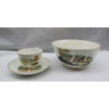 A 19th century porcelain tea cup and saucer with matching slops basin,