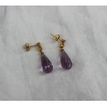 A pair of amethyst and citrine drop earrings,