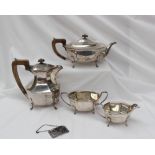 A George VI silver four piece tea set, comprising a hot water pot, teapot,