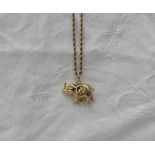 An 18ct yellow gold rope twist necklace, together with an 18ct yellow gold elephant pendant,