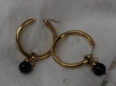 A pair of 18ct yellow gold hoop earrings,