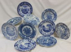 A blue and white pottery dessert plate decorated in the Kirkstall Abbey pattern ,